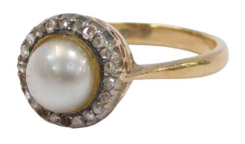A 9ct gold and cultured pearl ring, in a surround of tiny diamonds, in a basket setting, size L,...