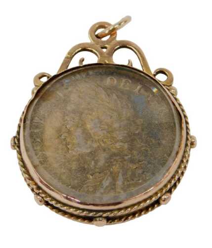 A George II silver shilling 1758, in a 9ct gold pendant mount, 16.9g all in.