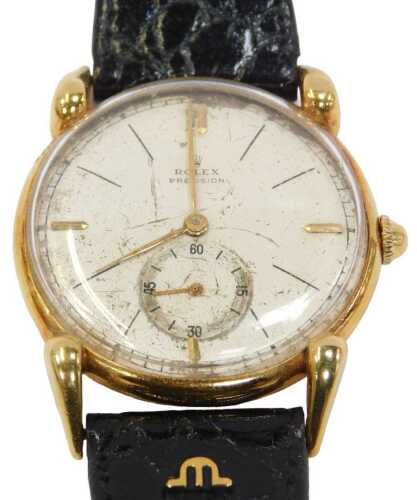 An 18ct gold Rolex Precision gentleman's wristwatch, with a cream batoned dial and seconds dial,...