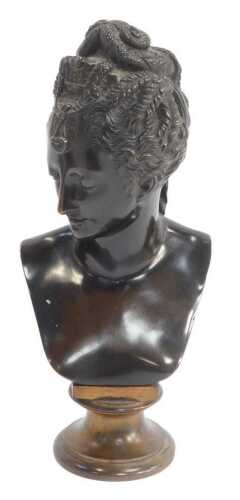 After Jean Goujon. Diane de Poitiers, a brown patinated bronze bust, raised on a gilt socle base,...