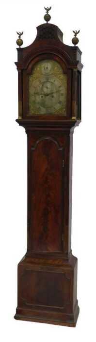 A George III mahogany longcase clock, with pillared and reeded hood, with brass ball and eagle...