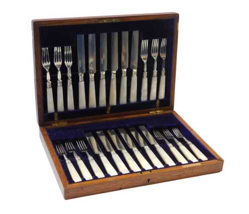 An Elkington & Co Ltd Victorian silver and mother of pearl dessert service, for twelve place settings, London 1872, in an oak case.