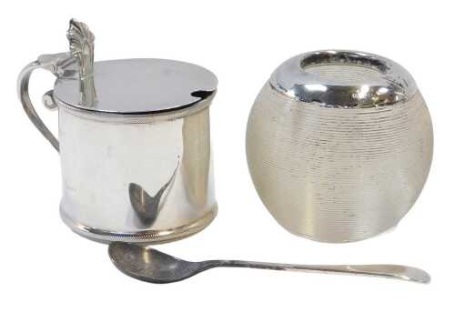 A George V silver lidded mustard pot, with a blue glass liner, Sheffield 1934, together with a...
