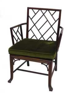 A late 18thC mahogany cockpen chair, in the Chinese Chippendale style, with solid frame, drop in...
