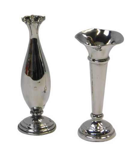 A Continental bud vase, of a baluster form with a decorative rim, raised on a circular stepped...