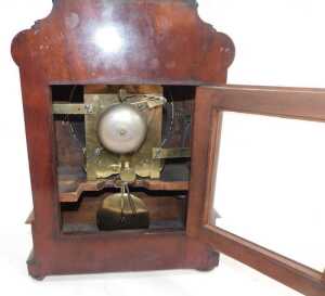 An early Victorian mahogany bracket clock, with a carved scroll-top breakfront case with bun... - 6