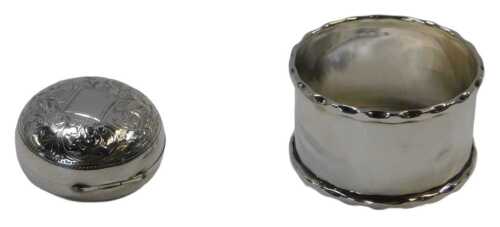 A George VI silver napkin ring, engraved Michael, Birmingham 1937, together with a silver...