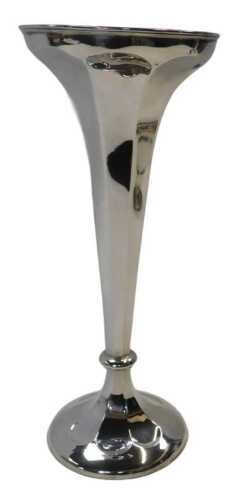 A George V filled silver trumpet vase, of faceted form, raised on a circular base, Travis Wilson...