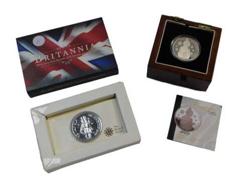 A London Mint Office 2009 Tristan du Cunha silver five pound Christmas crown, together with a...