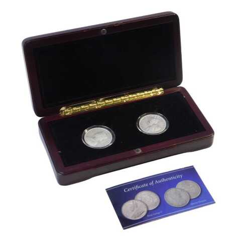 Two one-rupee coins, for George V 1918, and Queen Victoria 1885, in fitted case. N.B. We have...