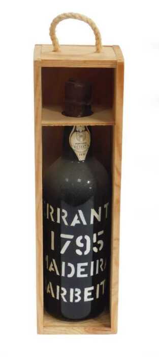 A bottle of Terrante 1795 Barbeito Madeira, bearing a paper label numbered 613867, with a wax...