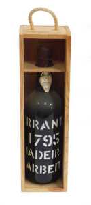 A bottle of Terrante 1795 Barbeito Madeira, bearing a paper label numbered 613867, with a wax...