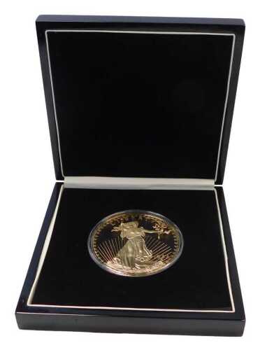 A London Mint Office USA 1933 gold twenty dollar double eagle scale reproduction coin, 24ct gold...