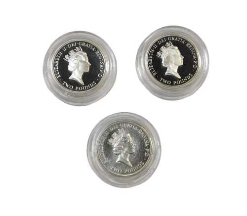 A Royal Mint 1989 two pound silver proof coin set, together with a United Kingdom XIII...