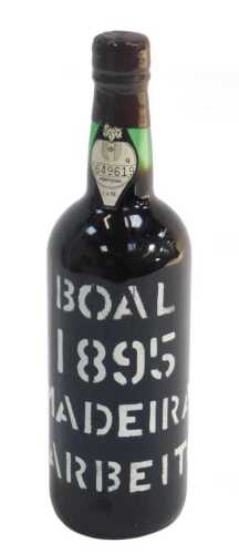 A bottle of Boal 1895 Barbeito Madeira, bearing paper label numbered 0649619, with partial wax...