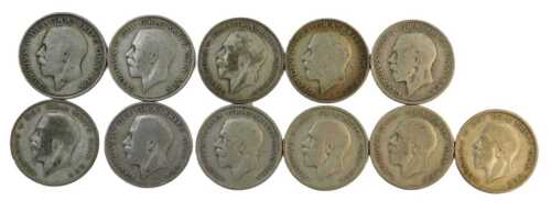 Eleven George V part silver half crowns, 151.4g.