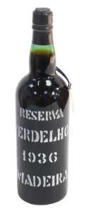 A bottle of Reserva Verdelho 1936 Madeira, with partial wax seal.