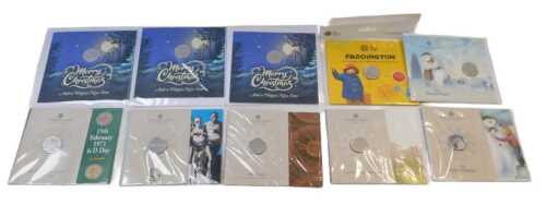 Ten Royal Mint and other commemorative fifty pence coins, to include The Snowman, Paddington,...
