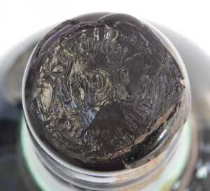 A bottle of Reserva Sercial 1945 Madeira, with partial wax seal. - 4