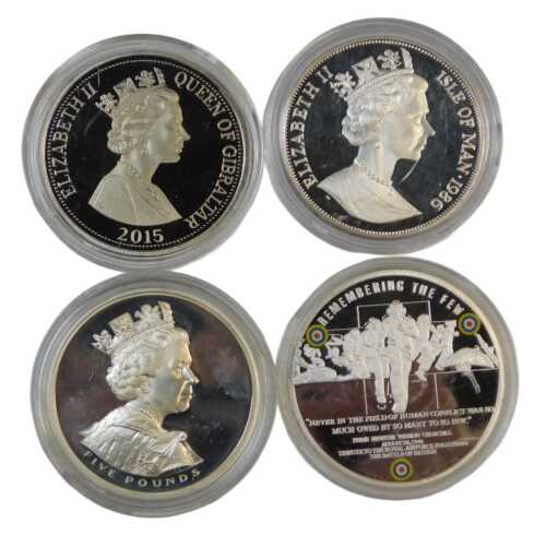 Three Elizabeth II silver proof one-crown coins, together with a 2002 silver proof five-pound...