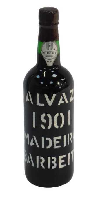A bottle of Malvazia 1901 Barbeito Madeira, with paper label number 486382, with wax seal.