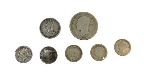 Victorian silver coinage, comprising an 1879 half crown, an 1887 shilling, together with five...