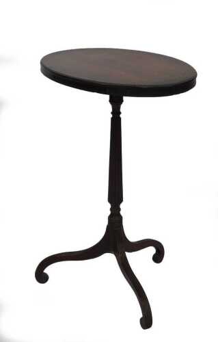 A George III wine table, with oval laburnum top with rosewood crossbanding, the reeded column...