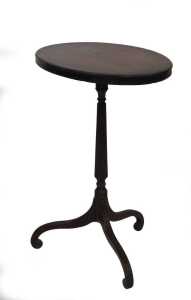 A George III wine table, with oval laburnum top with rosewood crossbanding, the reeded column...
