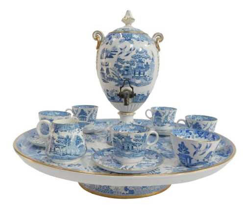 A 19thC Copeland porcelain Willow pattern lazy Susan, fitted with a central urn-shaped samovar,...