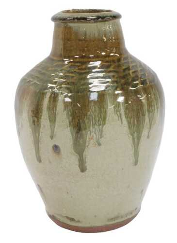 A George Rainer studio stoneware vase, of cylindrical shouldered form, decorated in a moss-green...
