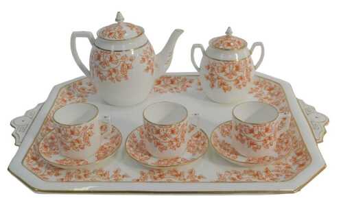 A late 19thC/early 20thC porcelain cabaret teaset, comprising teapot, three teacups and saucers,...