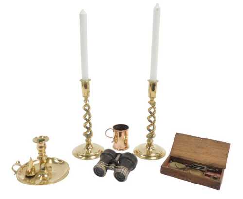 A group of metalware, comprising a pair of 19thC brass candlesticks, each with a spirally turned...