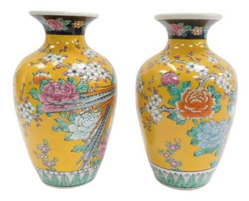 A pair of 20thC Chinese porcelain vases, each of cylindrical tapering form with a flared neck,...