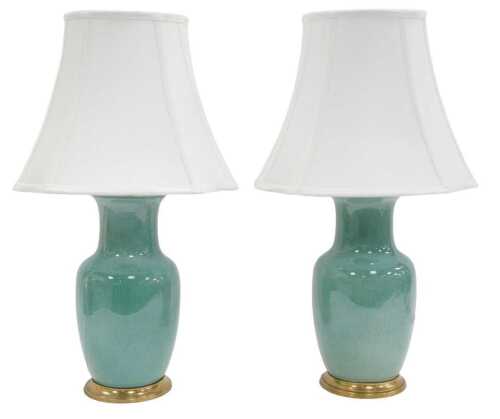 A pair of 20thC celadon glazed porcelain table lamps, each of cylindrical tapering shouldered...