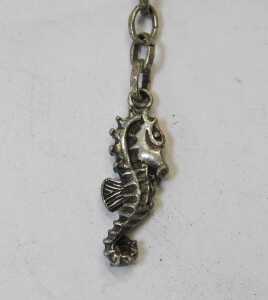A contemporary four-link bracelet, white metal and coloured art glass, cast as open panels of... - 3