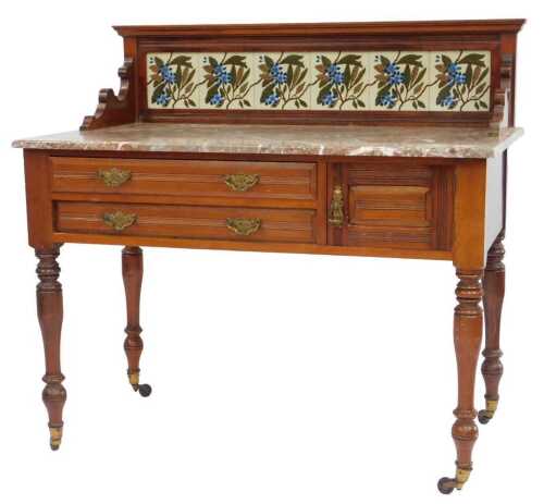 A late 19thC Heale and Sons of London walnut wash stand, the raised back inset with ceramic...