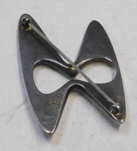 A Georg Jensen sterling silver brooch, number 369, designed by Henning Coppel, maker's stamps to... - 2