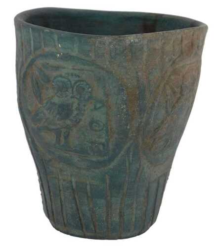 A handmade pottery beaker, bearing the Owl of Athena, of tapered reeded form, with four...