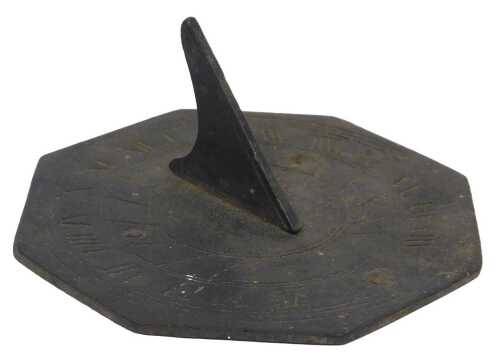 An 18thC bronze sundial, with an octagonal dial plate and plain gnomon, 4.5cm high, 11cm diameter.