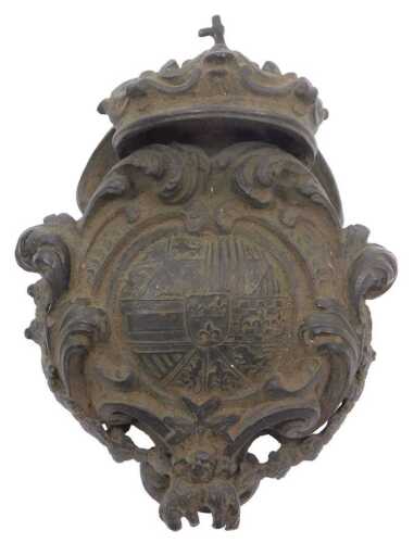 An 18thC Continental bronze coat of arms appliqu&eacute;, with coronet above an armorial crest within...