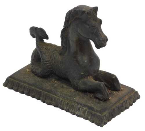 A 19thC bronze patinated figure of a hippocampus, on a rectangular plinth with an iron-filled...