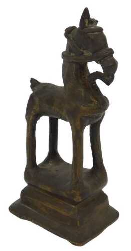A 19thC Indian brass figure of Vahana Nandi, the mount of Lord Shiva, 14.5cm high.