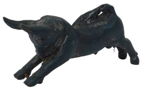 A bronze patinated cast figure of a Cretan Bull, legs outstretched, 13.5cm long.