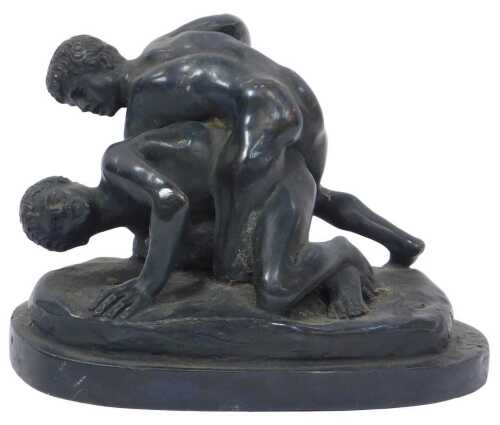 A 19thC cast bronze figural group of The Pergamon Fighters, after the classical antique, 11cm high.