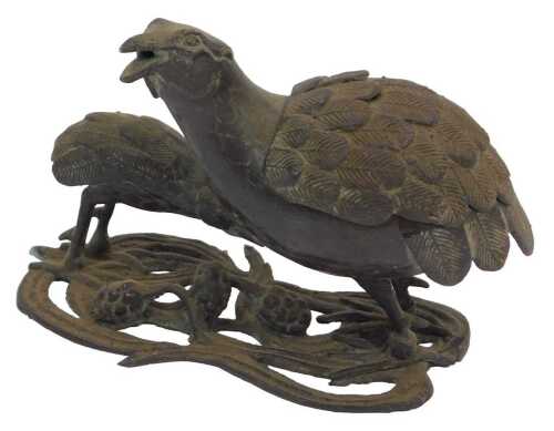 An 18th/19thC Chinese bronze quail censer, with a quail chick and millet to the openwork base,...