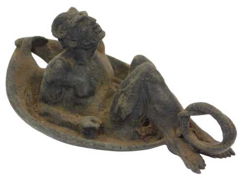 An 18th/19thC bronze wall plaque, depicting the horned devil within an oval winged shield and...