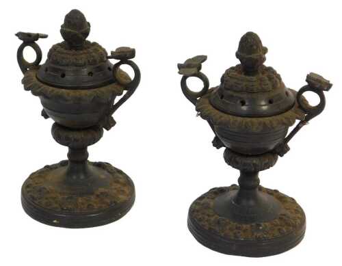 A pair of small 18thC bronze censers, of classical urn-shaped form with butterfly wing handles...