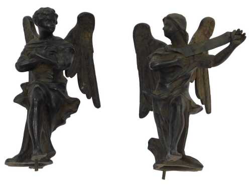 A pair of 18th/19thC bronze angel surmounts, one with folded arms, the other holding a banner,...