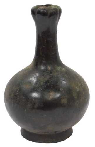 An archaic Chinese Han dynasty bronze garlic-mouth vase, ring loops to the underside, 29.5cm high.