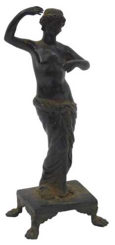 An early 19thC Grand Tour bronze figure of Venus, in classical semi-clad standing pose, on a...